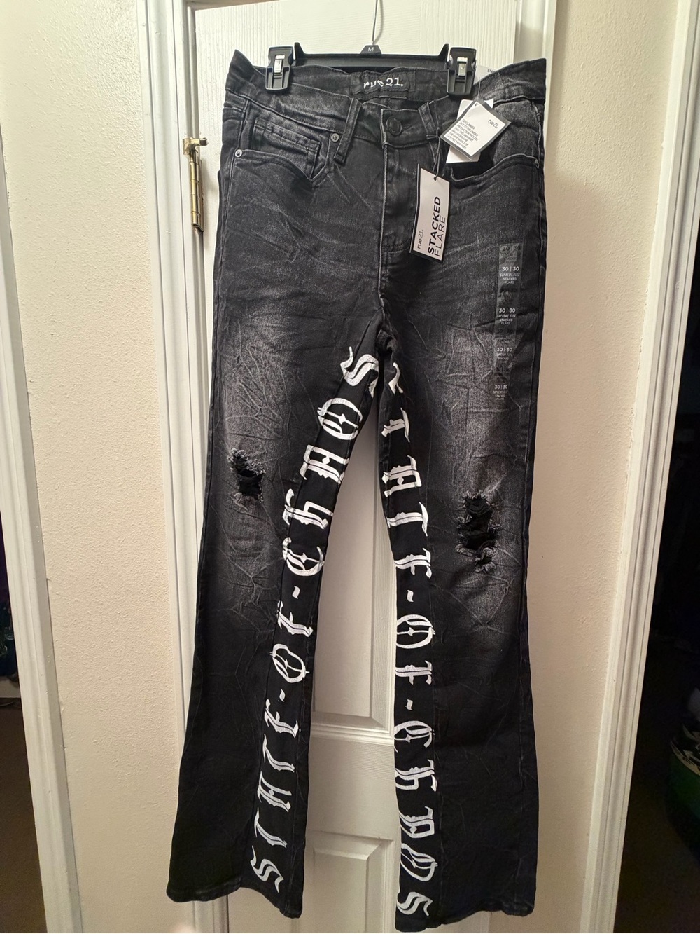 Rue21 Black Flare Stacked Jeans with White Script Down Legs